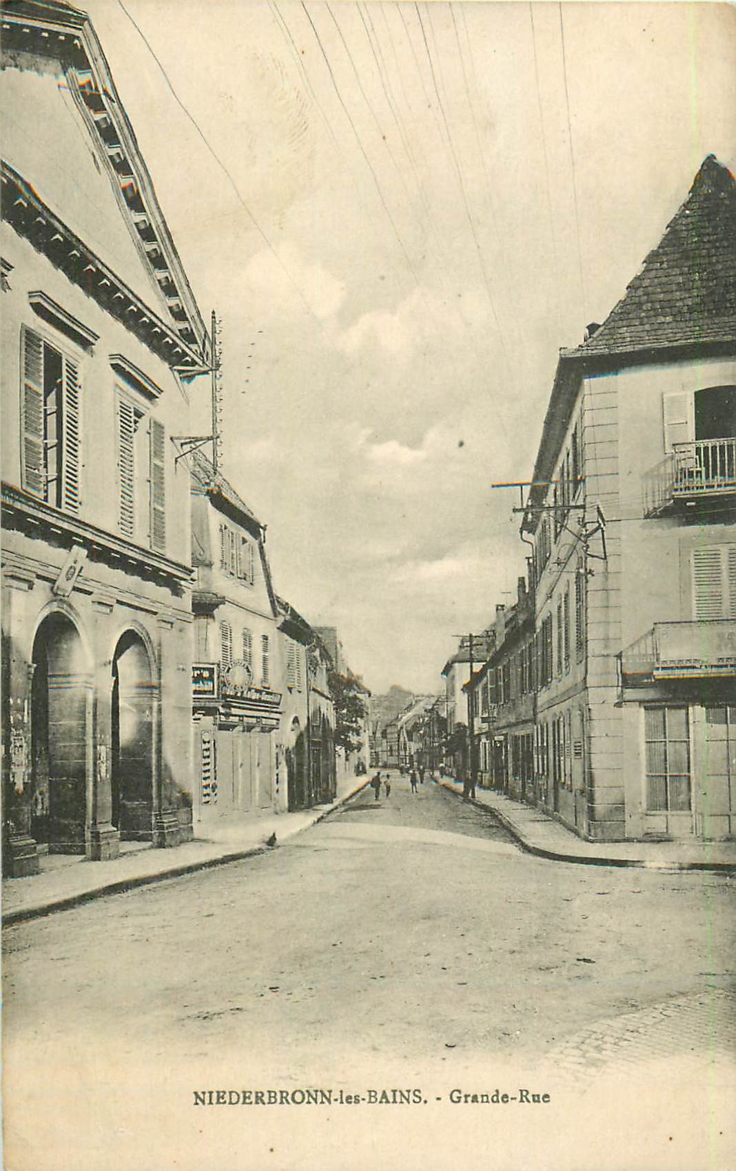 67 NIEDERBRONN-LES-BAINS. Grande Rue commerce et animation 1925
