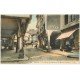 carte postale ancienne 22 DINAN. Rue des Cordeliers animée. Davy Chapelier et commerce "" A la Grace de Dieu ""