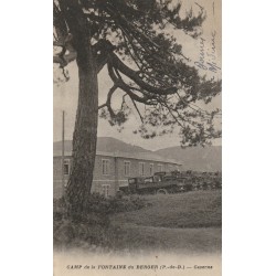 63 CAMP de la FONTAINE du BERGER. Camions militaires devant la Caserne