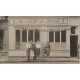 Cpa Photo d'un Café Restaurant " Au Siège de Brest " au numéro 57 d'une rue et ville à identifier...