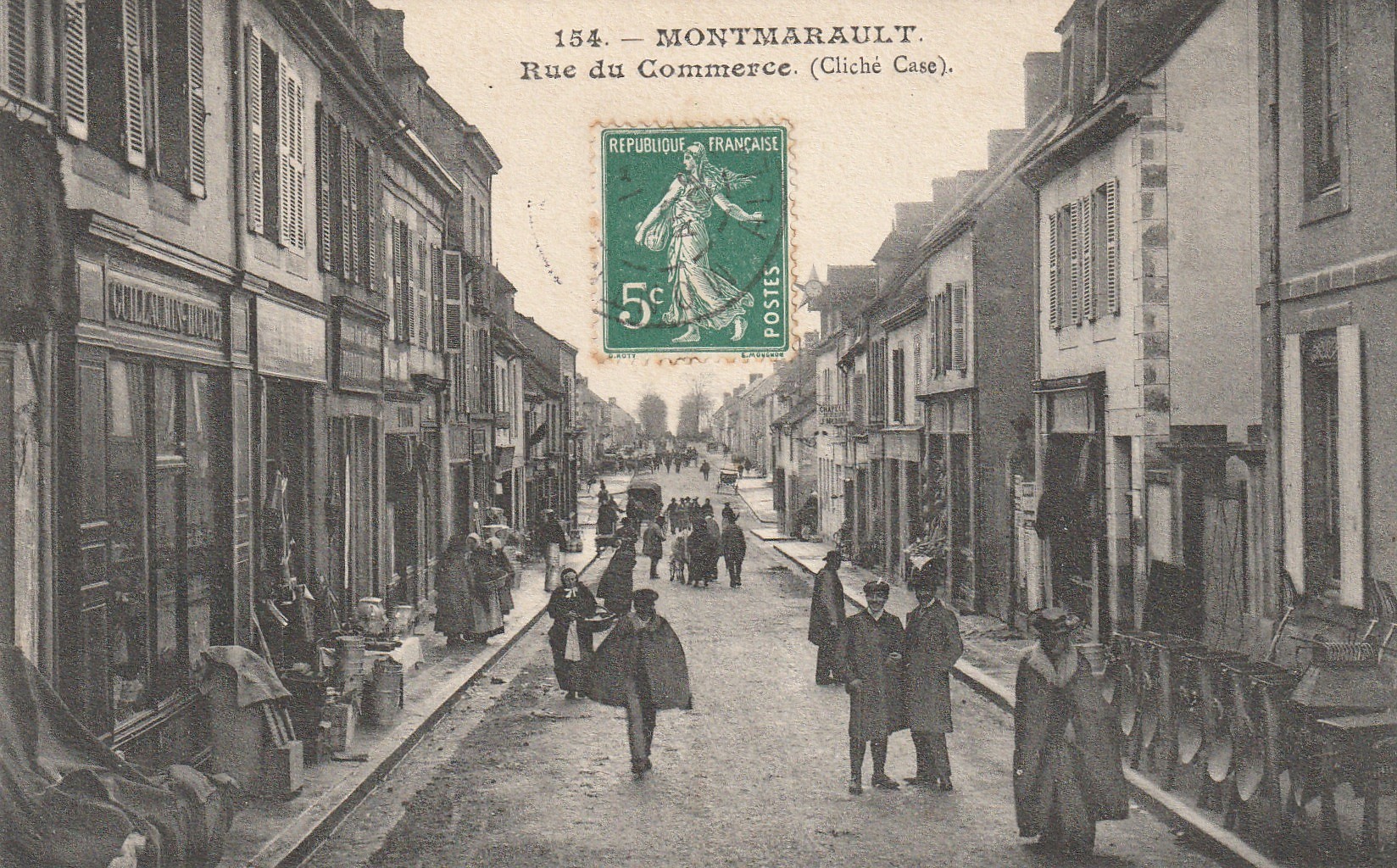 03 MONTMARAULT. Rue du Commerce 1908