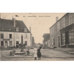 58 CHAMPLEMY. Fillettes Route de Prémery avec Commerce Raffaitin 1921