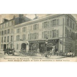 carte postale ancienne 77 FONTAINEBLEAU. Grande Rue Garage et Cycles Automobiles. Voitures et vélos