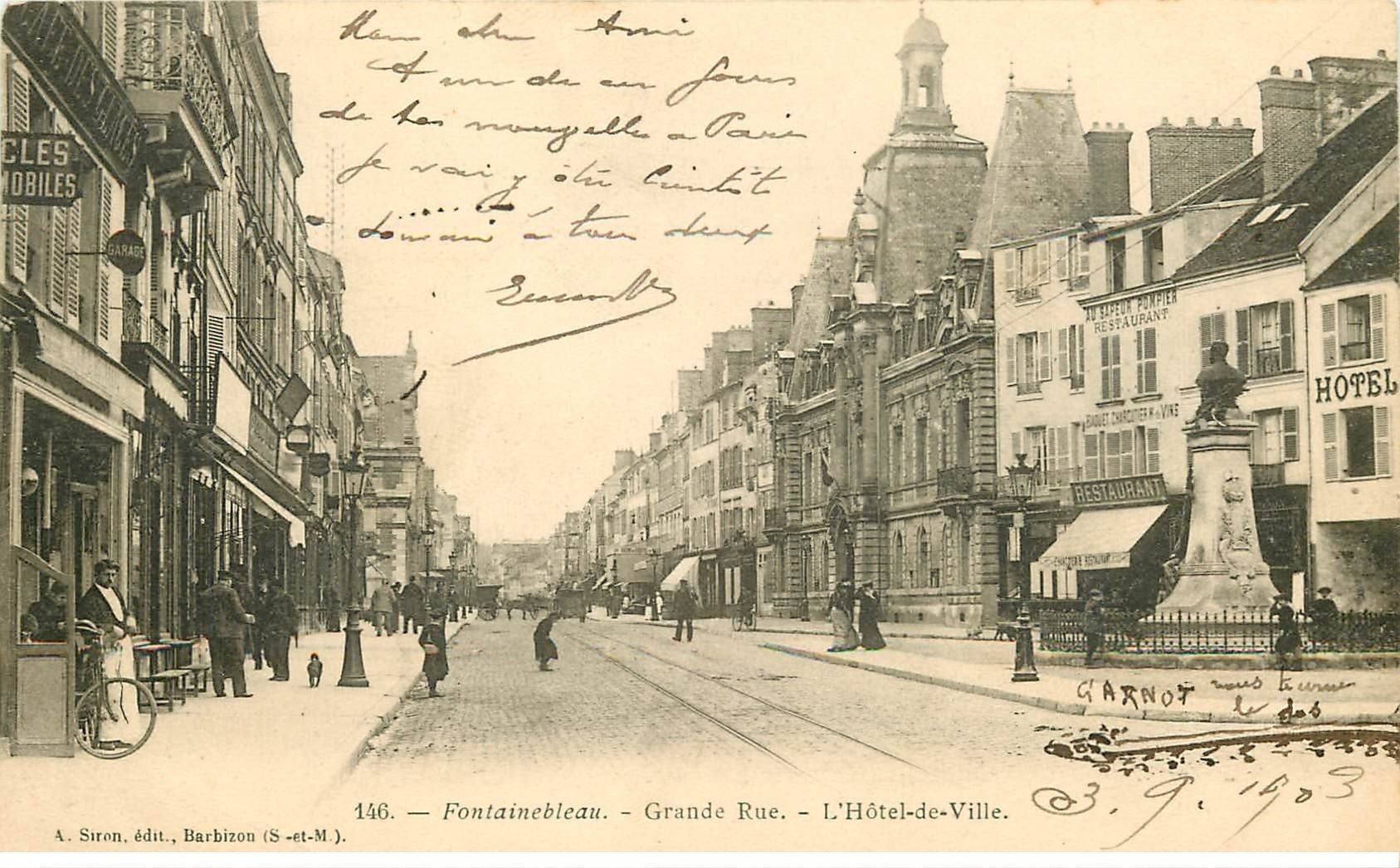 carte postale ancienne 77 FONTAINEBLEAU. Grande Rue hôtel de Ville1903 Restaurant au Sapeur Pompier