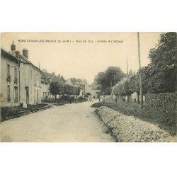 carte postale ancienne K. 77 MONTCEAUX-LES-MEAUX. Entrée du Village Rue de Lizy avec Chasseur de Papillons