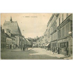 carte postale ancienne 28 DREUX. Grande Rue 1917. Habillement Au Progrès