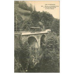 carte postale ancienne 65 ROUTE DE PIERREFITTE à LUZ-SAINT-SAUVEUR. Pont d'Enfer avec Tramway 673