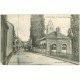 carte postale ancienne 27 RUGLES. La Grande Rue 1916. coin gauche biseauté