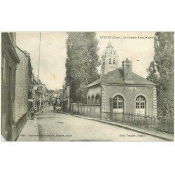 carte postale ancienne 27 RUGLES. La Grande Rue 1916. coin gauche biseauté