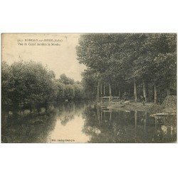 carte postale ancienne 10 ROMILLY-SUR-SEINE. Pêcheur sur le Canal derrière le Moulin vers 1929