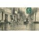 carte postale ancienne Inondation et Crue de 1910. ASNIERES 92. Le Quai avec Garage de canots...