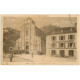carte postale ancienne 64 LARUNS. Sortie de Messe. Eglise et Hôtel des Voyageurs