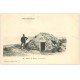 carte postale ancienne 50 COUTAINVILLE. Cabane de Douane sur la Plage avec Douanier