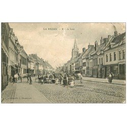carte postale ancienne 62 LA BASSEE. Rue de Lens 1906. Défauts...