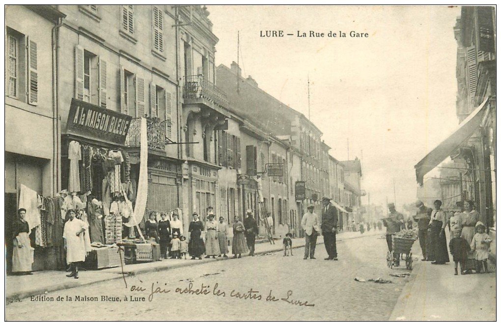 carte postale ancienne 70 LURE. Rue de la Gare 1917. A la Maison Bleue Magasin de cartes postales et Editeur