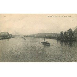 carte postale ancienne 78 LES MUREAUX. Remorqueur sur la Seine et train de Péniches