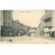 carte postale ancienne 88 REMIREMONT. Rue de la Xavée et Place de la Courtine Chausseur, Pâtisserie, Boucherie...
