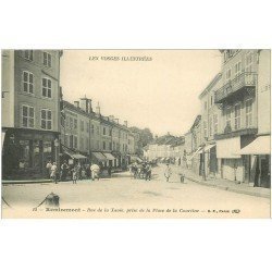 carte postale ancienne 88 REMIREMONT. Rue de la Xavée et Place de la Courtine Chausseur, Pâtisserie, Boucherie...