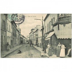 carte postale ancienne 93 ROMAINVILLE. Coiffeur et Commerce Simonot rue de Paris 1905