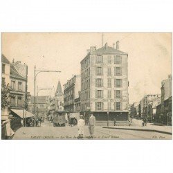 carte postale ancienne 93 SAINT DENIS. Rues du Chemin de Fer et Ernest Renan 1905 Hôtel des Voyageurs