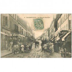 carte postale ancienne 92 COURBEVOIE. Triperie et Coiffeur Rue de Bezons 1907