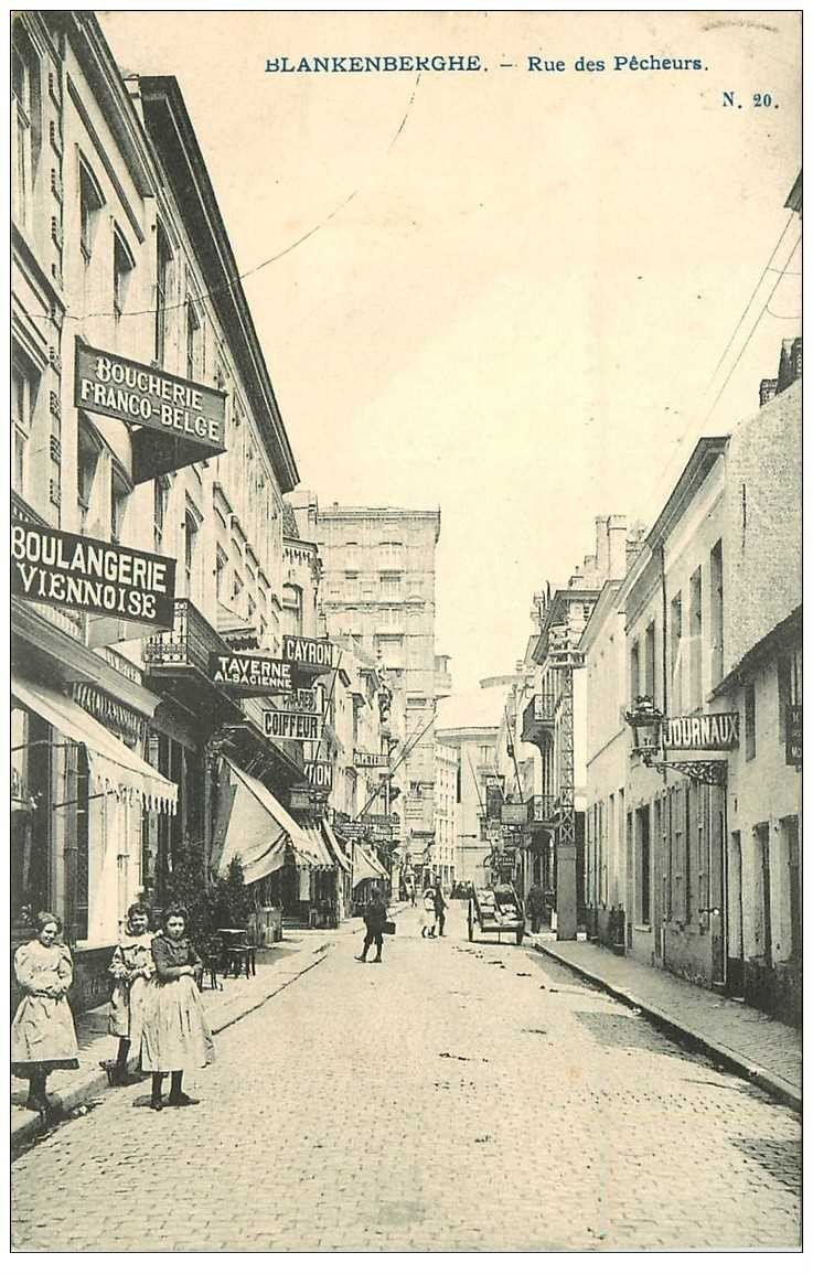 carte postale ancienne Belgique. BLANKENBERGHE. Rue des Pêcheurs 1905 Boucherie Boulangerie Coiffeur Taverne...