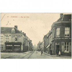 carte postale ancienne Belgique. FURNES. Rue de l'Est commerce Au Bon Marché 1915 Verne