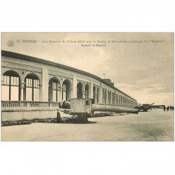 carte postale ancienne OSTENDE OOSTENDE. Digue Galeries Palace Hôtel et canons