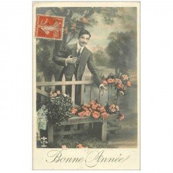 carte postale ancienne BONNE ANNEE. Fleurs sur un banc