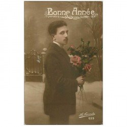 carte postale ancienne BONNE ANNEE. Homme et Fleurs 1918