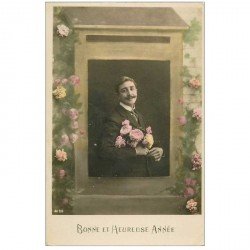 carte postale ancienne BONNE ANNEE. Homme et Fleurs 1919 dans une boîte à lettres