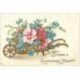 carte postale ancienne NOUVEL AN. Bonne Année carte gaufrée Fleurs et brouette 1905