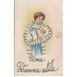 carte postale ancienne NOUVEL AN. Une Etrenne utile. Un Bébé carte pailletée vers 1900
