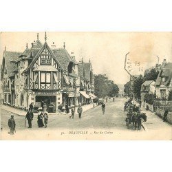 carte postale ancienne 14 DEAUVILLE. Rue du Casino 1914. Magasin Au Printemps. Timbre manquant