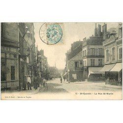carte postale ancienne 02 SAINT-QUENTIN. Rue Saint-Martin 1905. Fabrique de Brosses et Pharmacie