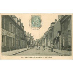 18 SAINT-AMAND-MONTROND. Le Facteur à vélo et le Commerce Baron rue Fradet 1905