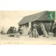 76 . ETRETAT. Pêcheurs réparant leurs filets autour d'une Caloge 1913