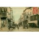 77 MELUN. Belle animation devant Felix Potin rue Saint-Etienne 1917