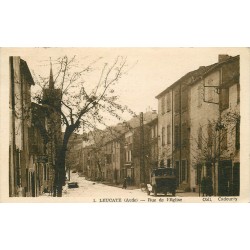 11 LEUCATE. Voiture bus et épicerie Ciral rue de l'Eglise 1925