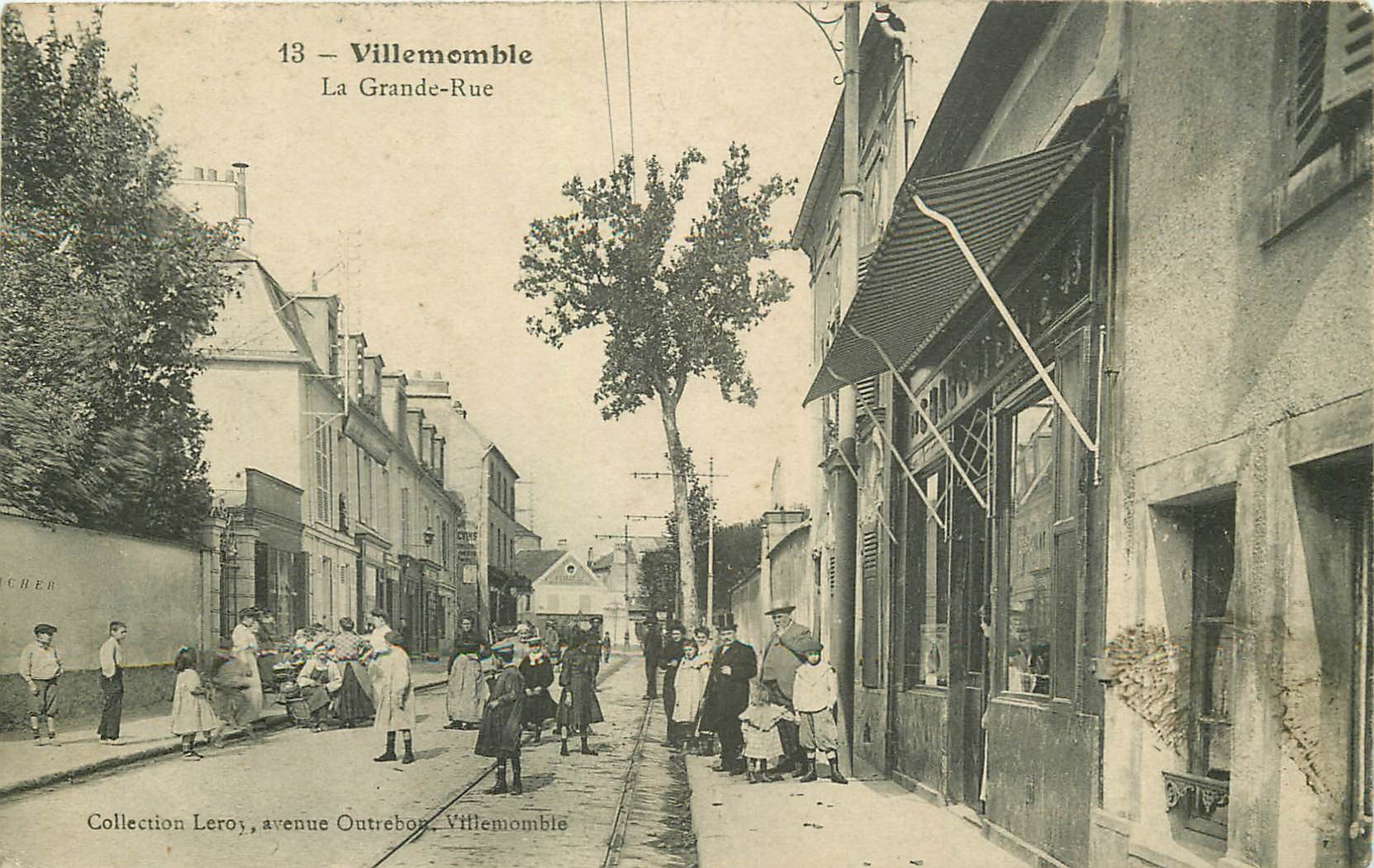 93 VILLEMOMBLE. La Grande Rue animation devant la Charcuterie 1905