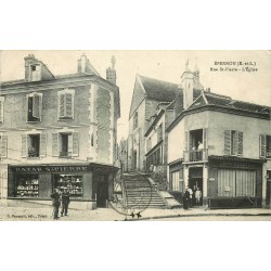 28 EPERNON. L'Eglise avec Bazar et Chapellerie rue Saint-Pierre 1931