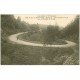 carte postale ancienne 63 ROUTE DE MONT-DORE à MUROLS. Tournant Ruisseau de Dyane avec Attelage 1915