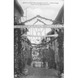 63 MONTAIGUT-EN-COMBRAILLE. Pélerinage rue Porte Montmarault 1911