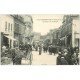03 COMMENTRY. Jour de Marché Rue de la Mine. Magasin SINGER et Tabac 1915