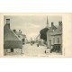 carte postale ancienne 18 COURS-LES-BARRES. Grande Rue traversée par des Roulottes de Romanichels 1918