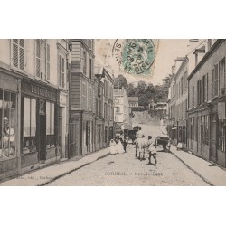 91 CORBEIL. Jeunes communiantes devant le Tailleur Rue du Pont 1906