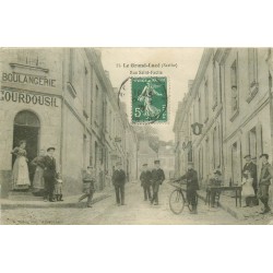 72 LE GRAND-LUCE. Rue Saint-Facile Cycliste devant Café et Boulangerie Courdousil 1910