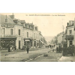 2 Cpa 63 SAINT-ELOY-LES-MINES. Au Bon Marché rue Nationale et l'installation des Manoirs 1903